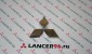 Эмблема задняя - Оригинал - Lancer96.ru-Продажа запасных частей для Митцубиши в Екатеринбурге